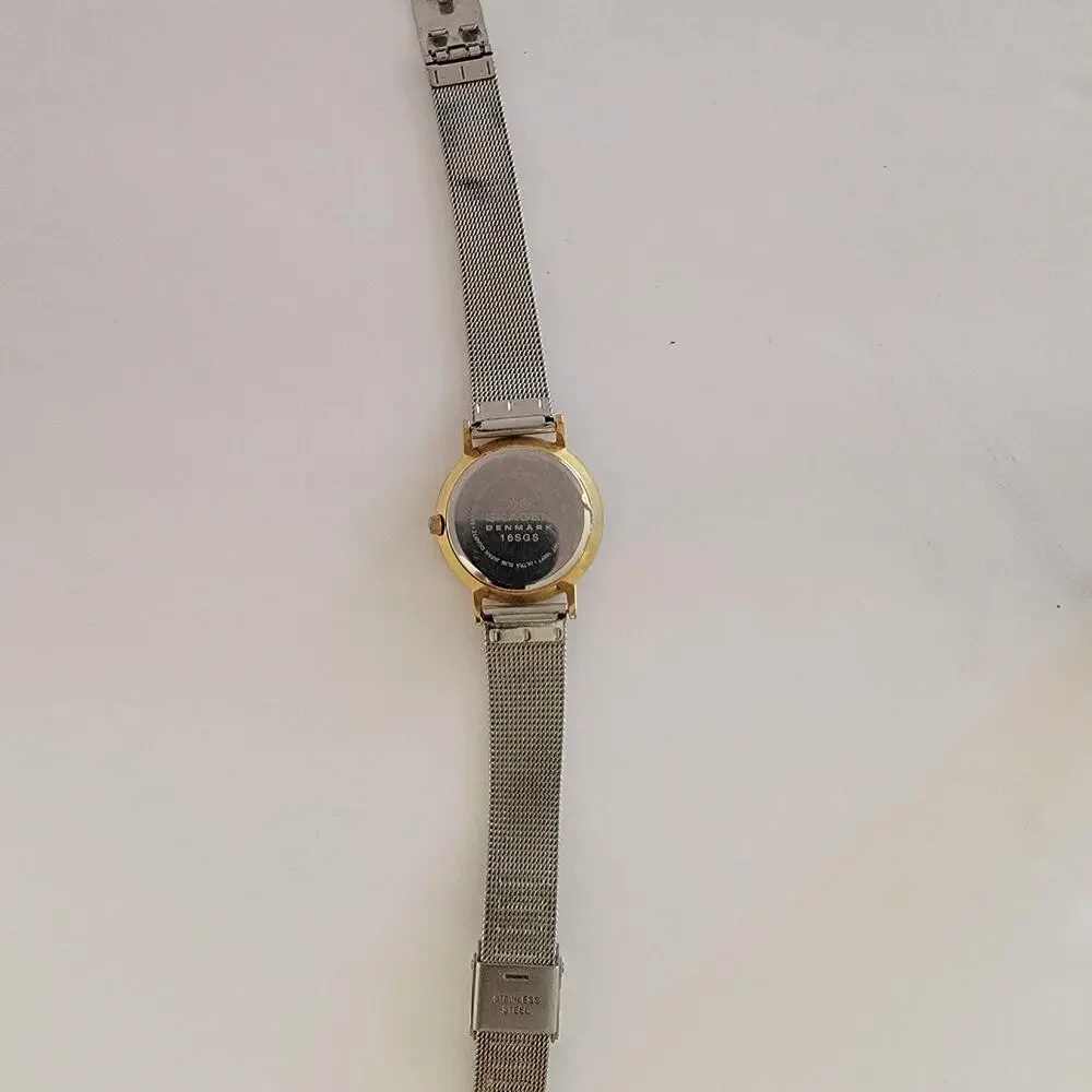Skagen Womens Watch Silver Dial Gold Case Silver Mesh Bracelet Date 165GS